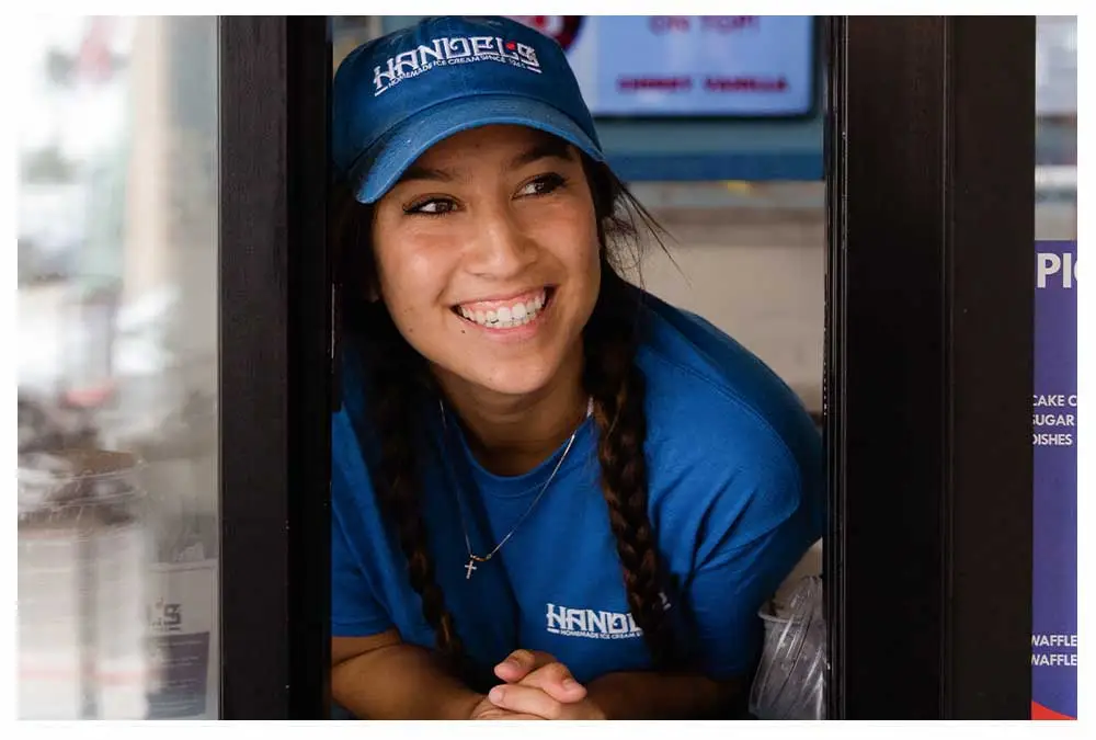 Handel's team member smiling in drive thru window