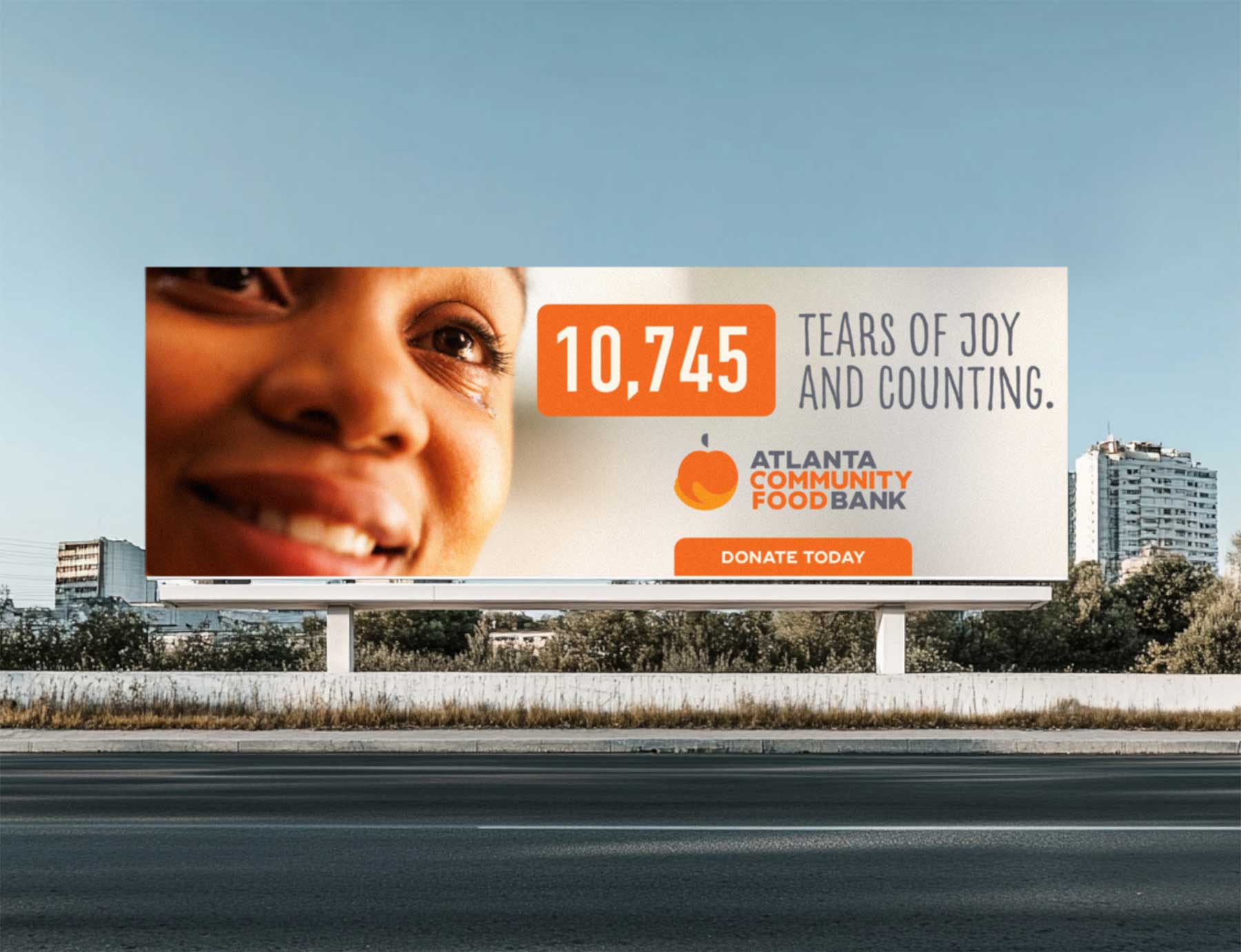 Atlanta Community Food Bank billboard that reads 10,745 Tears of Joy and Counting