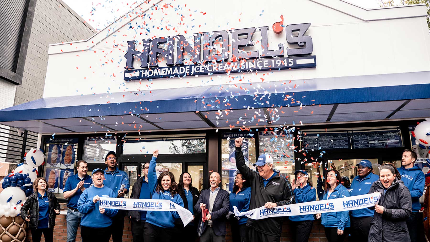 Handel's Ice Cream employees celebrating a store openin