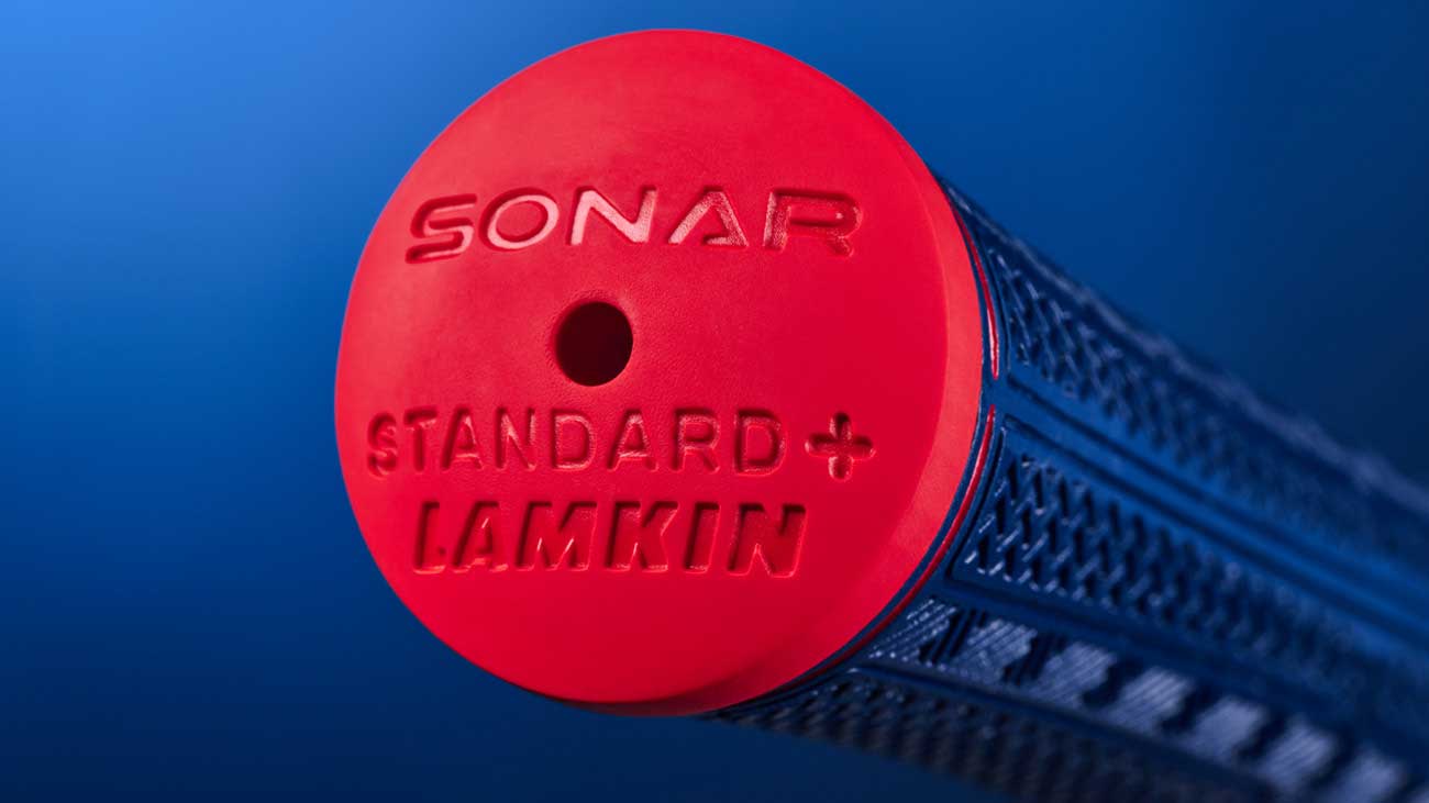 closeup of the end cap of a Sonar Hero swing grip from Lamkin Golf Grips